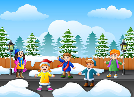 Vector illustration of Cartoon kids playing in the snowing gardenのイラスト素材