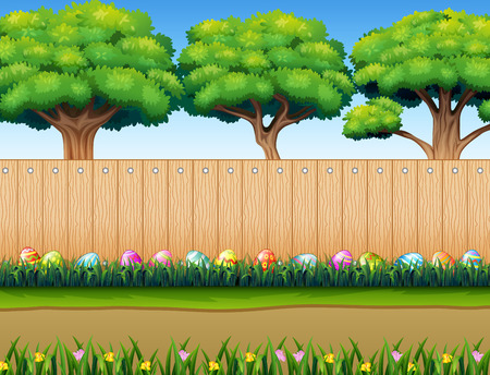 Easter eggs decorative on the grass with wooden fenceのイラスト素材