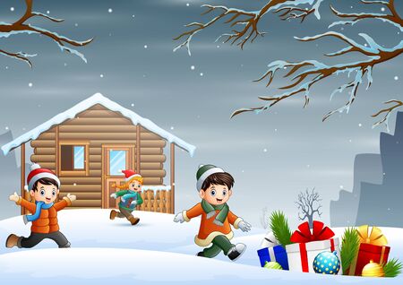Cartoon children enjoying winter christmas in front the houseのイラスト素材