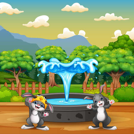 Cartoon happy bunnies standing near the fountainのイラスト素材