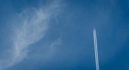 Plane Vapour Trailの写真素材