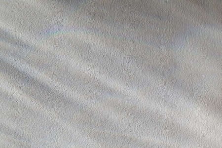 Light shadow on the cement wall is background.の写真素材