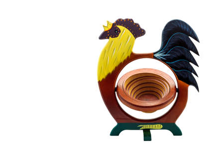Chicken carve from wood and have hold space for thing on white background.の写真素材