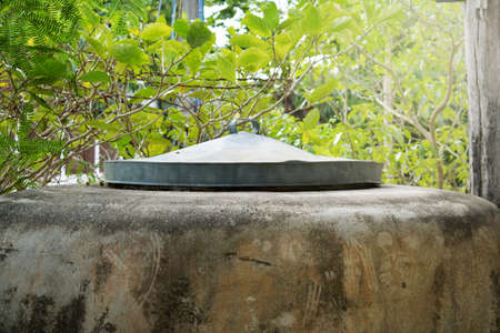 A big earthenware vat, it's a Thai water tank that people in country use for store water from rain...