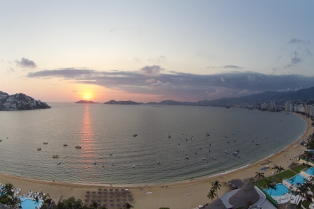 huge bay of hotels stretching along the coast in acapulco, mexicoのeditorial素材