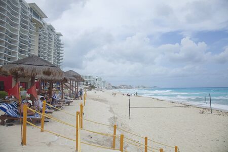 the bay of hotels stretching along the coast in cancun, mexicoのeditorial素材