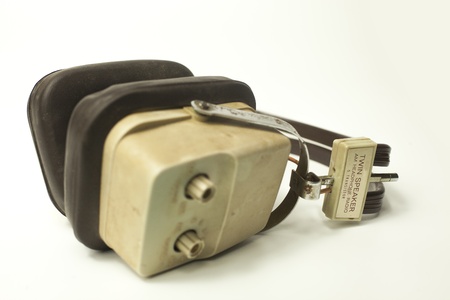 retro headphones shot against white