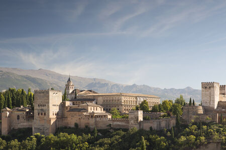 shot of the alhambra palace in granada with the sierra nevada mountains in the distanceのeditorial素材