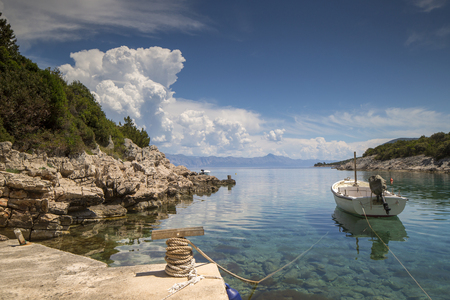 a small cove on Hvar island, croatia with stunning cystal clear waterの写真素材