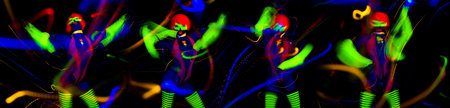 sexy female disco dancer poses in UV fluorescent costume