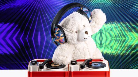 amazing funky teddy bear brought to life DJing on mini turntablesの写真素材