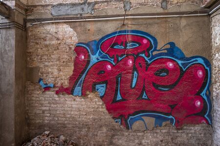 urban loft in construction with word love graffiti sprayed on the wallの写真素材