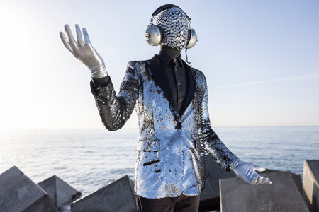 Mr disco man with sparkly face and headphones