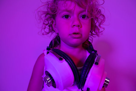 Small girl DJ with headphonesの写真素材