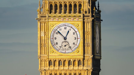 big ben in london, england with the clock face replaced with analogue clock