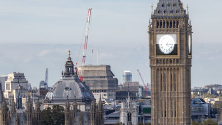 big ben in london, england with the clock face replaced with analogue clock