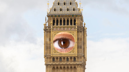 big ben in london, england with the clock face replaced with eyeの写真素材