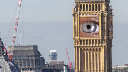 big ben in london, england with the clock face replaced with eye