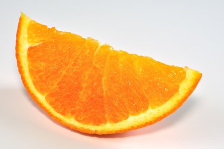 Isolated slice of orange on white background