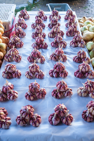 Sao Paulo, Brazil - 15 August, 2015 - sets of garlic in a stall in a street market.の写真素材