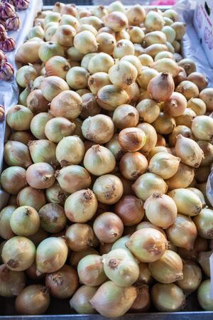 Sao Paulo, Brazil - 15 August, 2015 - onions in a stall in a street market.の写真素材