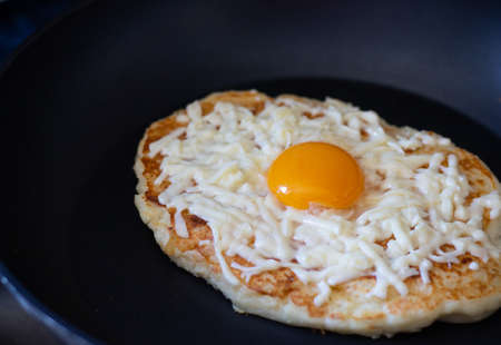 Adjarian khachapuri in a frying pan. Dietary low-calorie khachapuri with cottage cheese dough on a white plate. Proper nutrition. simple breakfastの写真素材