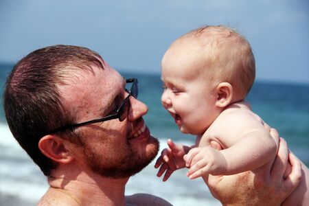 Father and daughter at seaの写真素材