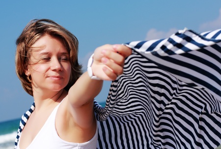 portrait of beautiful young woman on the beachの写真素材