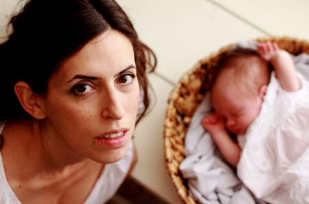 young mother with her newborn baby