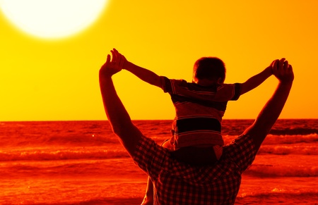 father and son on the seaの写真素材