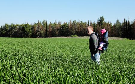 Dad and daughter outdoors