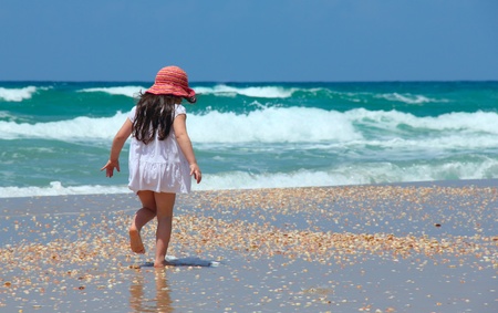 beautiful girl 5 years old on the beachの写真素材