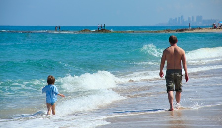 father and son on the seaの写真素材