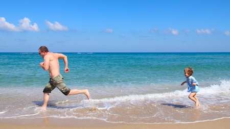 father and son on the seaの写真素材