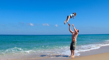 father and son on the seaの写真素材