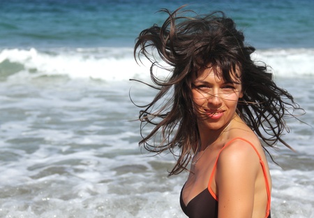 Portrait of beautiful girl on the beachの写真素材