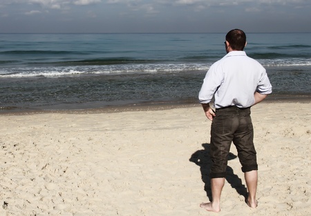 man enjoying a beautiful seascape の写真素材