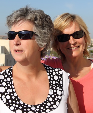 Portrait of two smiling womanの写真素材