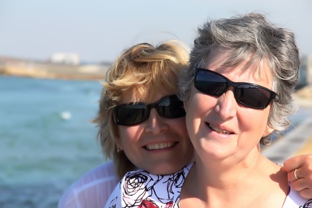 Portrait of two smiling womanの写真素材