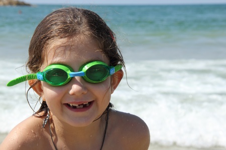  girl laughing in the sea on a sunny day の写真素材