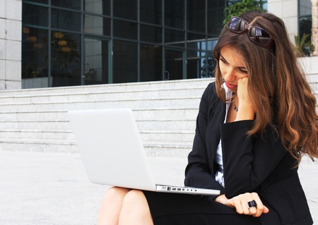 Sad beautiful young business woman  Tiredの写真素材