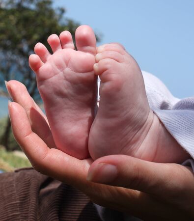 little feet in the motherの写真素材