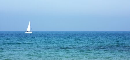 Sailing catamaran on the seaの写真素材