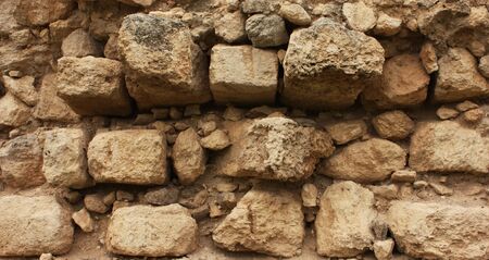 stone wall built without cement. Old Town.の写真素材
