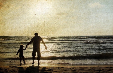 father and son on the sea  Photo in old color image style の写真素材