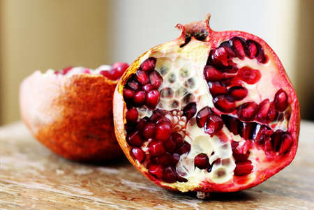 pomegranate fruit on wooden backgroundの写真素材