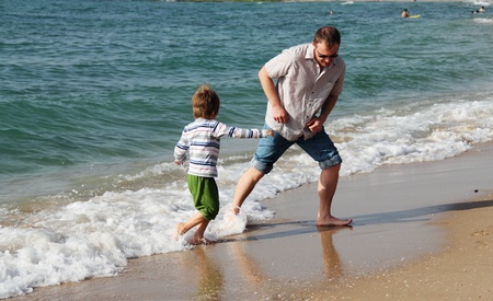 father and son at sea, springの写真素材