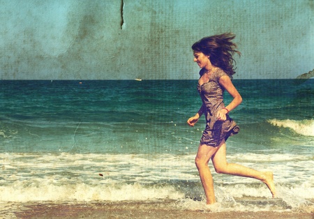 young girl at the sea  Photo in old color image style の写真素材