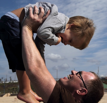 father and son on the seaの写真素材