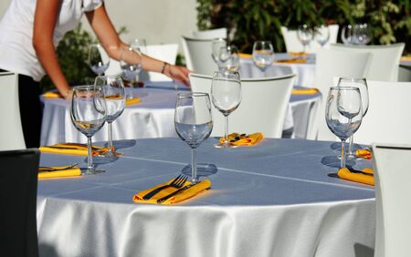 Table setting for garden banquetの写真素材